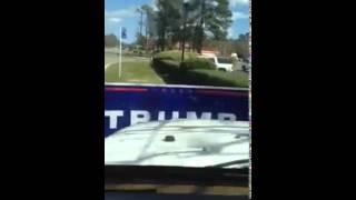 Driving over a Donald Trump sign
