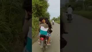 Kissing on motorcycle..