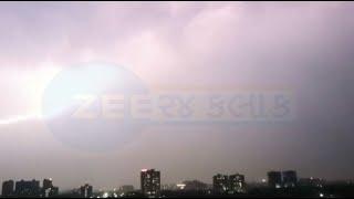 Amid unseasonal rain massive lightning strike caught on cam in Ahmedabad  Zee News