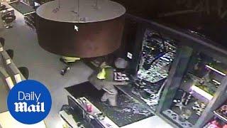 CCTV captures moment burglars break into hairdressers - Daily Mail