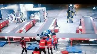 Guy gets stuck between conveyor belts