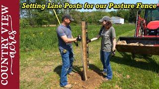 Installing Line posts and Bottom Barb Wire on our new Pasture Fence