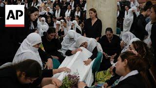 Members of the Druze community mourn victims of the Golan Heights attack