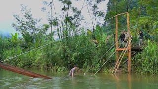 Fourth day of recovery after the storm. Villagers came to help rebuild the wooden bridge