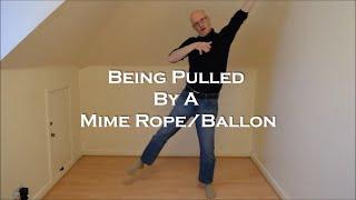 The basic mime technique to being pulled by a mime rope