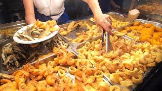 Italy Street Food. Paradise of Fried Fish Paella and Seafood. Pepero Fest Carmagnola