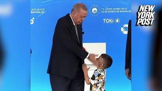 Turkish President Erdoğan slaps child in face for not kissing his hand video