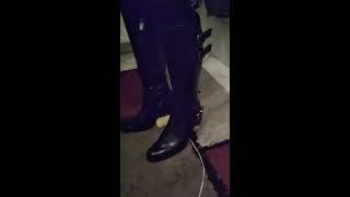 crushing a dog toy in sexy boots