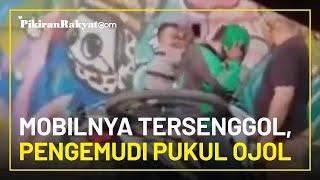 Video Viral di Media Sosial Tak Terima Mobilnya Tersenggol Pengemudi Tinju Driver Ojek Online