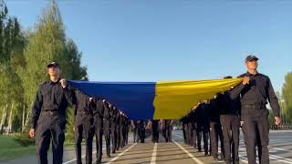 Підняття синьо-жовтого стягу курсантами 1-го курсу табірного збору в День Державного Прапора України