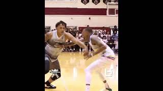 Dejounte Murray helping Paolo Banchero up off the floor at the Crawsover 