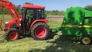 Kioti DK55 Baling Hay with a John Deere 447 Round Baler