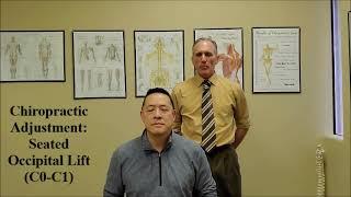 Chiropractic Adjustment Seated Occipital Lift C0 C1