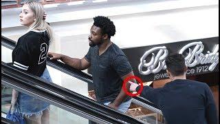 Touching Hands on the Escalator Prank