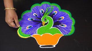 How to draw peacock kolam designs freehand - creative peacock rangoli art designs by Jayanthi G