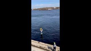 A Glovo Convenience Order Delivered by a Hydrofoil Surf Board Rider in Kyiv Ukraine