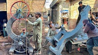 Hard Working Young Man Manufacturing Process of Giant BandSaw Machine in Factory