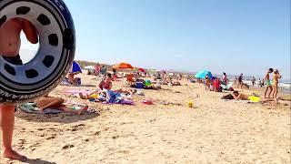 Walking on the beach on a very hot day in Valencia Spain 4K 60 FPS