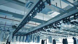 GLOBALink  Smart tech at E China clothing factory improves efficiency working environment