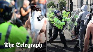 Far-Right groups clash with police as unrest spreads across UK