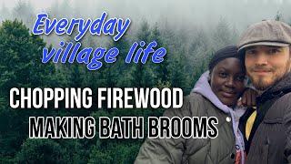 We are chopping firewood & making bath brooms  A tree feel on the tractor