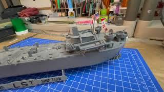 Navy cook on a  LST  and model kit