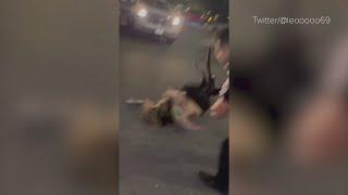 Viral video shows security guard slamming woman to the pavement in parking lot brawl