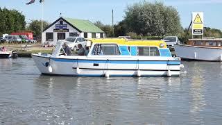 How to take a boat under Potter Heigham Bridge on the Norfolk Broads August 2019