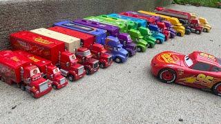 Lightning McQueen and other racers transport with Mack and haulers collection