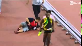 Usain Bolt Knocked Over By Cameraman On Segway After Winning World Championship 200m Gold