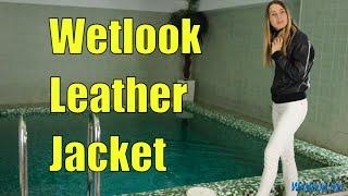 Wetlook girl in business style clothes is going to swim in the pool  Wetlook leather