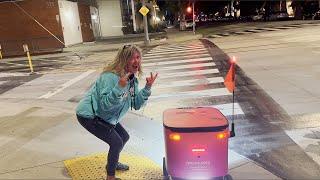 DAN & SALLY TRY TO CAPTURE COCO THE FOOD DELIVERY ROBOT ROAMING THE SANTA MONICA STREETS.
