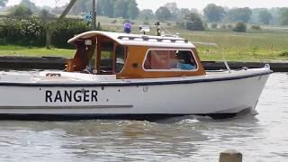 Watching boats going under Potter Heigham Bridge