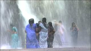 Ladies in sarees get wet under waterfalls in Kerala  Thirparappu