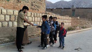 The cameraman asked Zainab Mohammad to buy notebooks for the school children