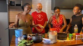 Two Ugandan Women Preparing Traditional Food