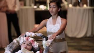 Sisters surprise Mom & Step-Dad at wedding with a special dance.