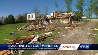 Finding a needle in a haystack Osceola family looks for precious memory in tornado wreckage