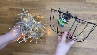 Wrap string light around a Dollar Store basket for this BREATHTAKING new idea