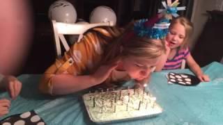 Moms hair catches fire on birthday candles