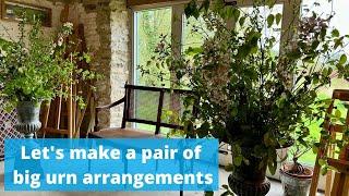 Lets make a pair of big urn arrangements all foliage and blossom to dress a dinner party.