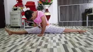 Full leg stretch of Taekwondo by little girl Prajkta