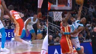 Brandon Miller has Hornets announcers going wild after nasty cross into poster dunk