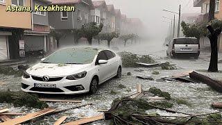 Windows and cars were damaged after Large hail fell in Astana Kazakhstan