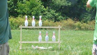 Dad Vs. Son Friendly Shooting Competition Bowling Pins