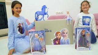 Masal and Öykü surprise toys - Elsa and Anna toddlers