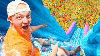 BIGGEST Backyard Water Slide With 100 MILLION ORBEEZ