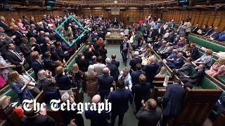 Theresa May refuses to clap for Boris Johnson in the Commons