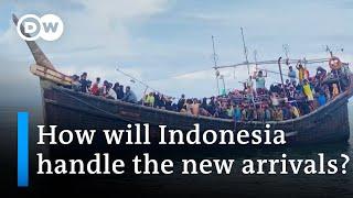 Hundreds of Rohingya refugees arrive by boat in Indonesias Aceh province  DW News