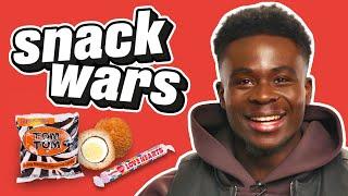 Arsenal Star Bukayo Saka Rates British And Nigerian Food  Snack Wars